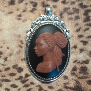 Elegant Silver and Brown Cameo Pendant